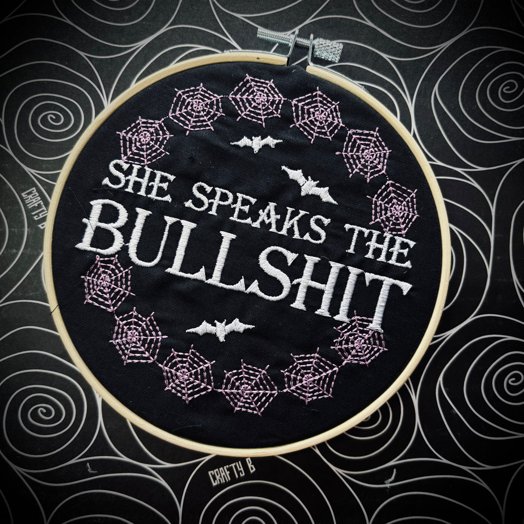 She Speaks the… - The Shadows Embroidered Hoop